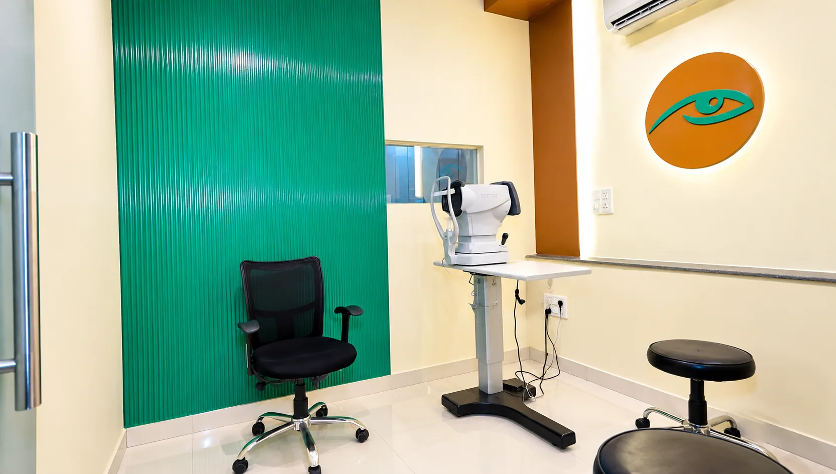 Clinical examination room prepared for an eye assessment.